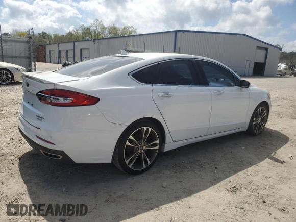 2019 Ford Fusion Titanium with VIN 3FA6P0K98KR233733, listed as a Copart auction lot 51134095 with 184,572 mi miles and Clean Title. Bid and sale history available at carsss.com. Image 3.