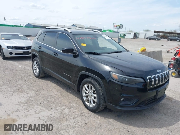 2019 Jeep Cherokee Latitude with VIN 1C4PJLCBXKD284954, listed as a IAAI auction lot 41877944 with 134,931 mi miles. Bid and sale history available at carsss.com. Image 1.