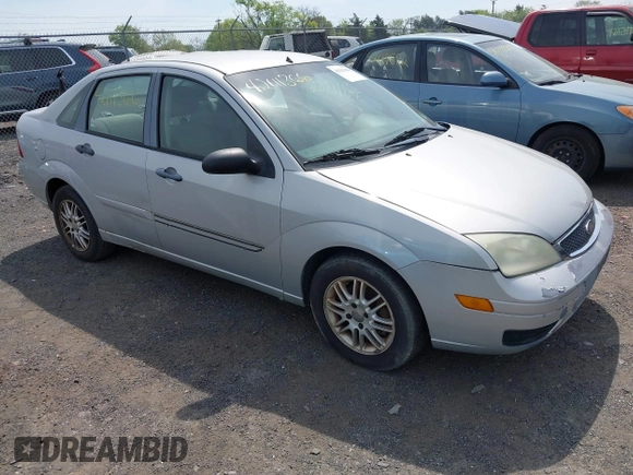 2007 Ford Focus S z VIN 1FAFP34N67W338545, wystawiony jako IAAI lot #42111366 z przebiegiem 370 000 mil mil oraz . Historia ofert i sprzedaży dostępna na DreamBid. Obrazek 1.