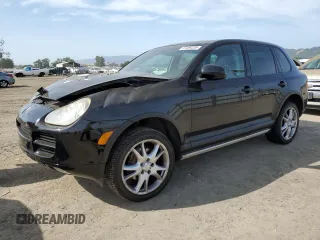2005 Porsche Cayenne z VIN WP1AA29P65LA24059, wystawiony jako Copart lot #57484235 z przebiegiem Nie podano mil oraz Szkoda całkowita • Salvage title. Historia ofert i sprzedaży dostępna na DreamBid. Obrazek 1.