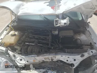 2007 Ford Focus S z VIN 1FAFP34N27W186716, wystawiony jako Copart lot #54894055 z przebiegiem 86 305 mil mil oraz Szkoda całkowita • Salvage title. Historia ofert i sprzedaży dostępna na DreamBid. Obrazek 11.