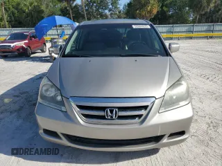 2007 Honda Odyssey EX-L with VIN 5FNRL387X7B043046, listed as a Copart auction lot 52604635 with 228,961 mi miles and Salvage Title. Bid and sale history available at carsss.com. Image 5.