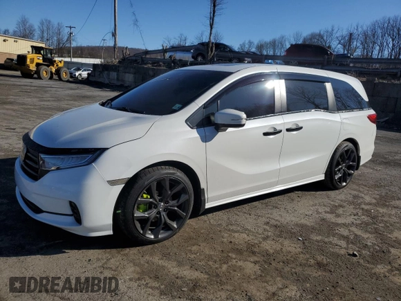 2021 Honda Odyssey EX-L with VIN 5FNRL6H78MB019258, listed as a Copart auction lot 52496285 with 33,734 mi miles and Salvage Title. Bid and sale history available at DreamBid. Image 1.