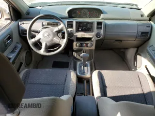 2006 Nissan X-Trail XE z VIN JN8BT08T06W100432, wystawiony jako Copart lot #70907374 z przebiegiem 263 759 mil mil oraz Szkody całkowita. Historia ofert i sprzedaży dostępna na DreamBid. Obrazek 8.