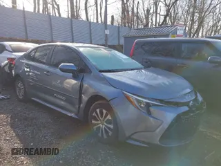 2022 Toyota Corolla Hybrid LE with VIN JTDEAMDE5NJ040950, listed as a IAAI auction lot 41875556 with 30,943 mi miles. Bid and sale history available at carsss.com. Image 1.
