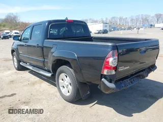 2015 Toyota Tacoma with VIN 3TMMU4FN7FM085666, listed as a IAAI auction lot 42051241 with 224,513 mi miles and . Bid and sale history available at DreamBid. Image 3.