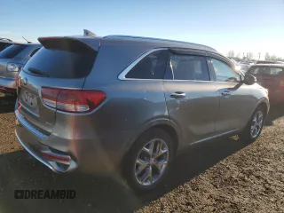 2016 Kia Sorento SXL z VIN 5XYPKDA15GG105354, wystawiony jako Copart lot #79710674 z przebiegiem 167 327 mil mil oraz Czysty tytuł • Clean title. Historia ofert i sprzedaży dostępna na DreamBid. Obrazek 3.