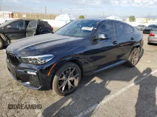 2021 BMW X6 xDrive40i with VIN 5UXCY6C04M9H02068, listed as a Copart auction lot 46938645 with 21,913 mi miles and Salvage Title. Bid and sale history available at carsss.com. Image 1.