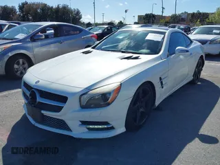 2013 Mercedes-Benz SL-Class SL 550 with VIN WDDJK7DA7DF005702, listed as a IAAI auction lot 41785274 with 143,569 mi miles. Bid and sale history available at carsss.com. Image 2.