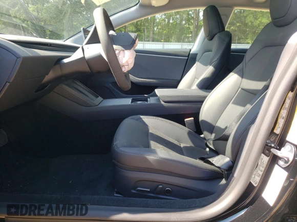 2025 Tesla Model 3 Long Range with VIN 5YJ3E1EA4SF965566, listed as a Copart auction lot 56820165 with 1,041 mi miles and Salvage title. Bid and sale history available at DreamBid. Image 7.