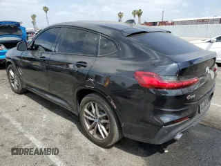 2020 BMW X4 xDrive30i z VIN 5UX2V1C0XL9B93562, wystawiony jako Copart lot #56180595 z przebiegiem 71 667 mil mil oraz Szkoda całkowita • Salvage title. Historia ofert i sprzedaży dostępna na DreamBid. Obrazek 2.