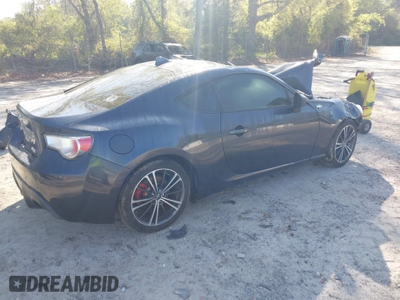 2015 Scion FR-S with VIN JF1ZNAA10F8707671, listed as a IAAI auction lot 42000130 with 136,734 mi miles. Bid and sale history available at carsss.com. Image 4.