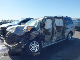 2005 Honda Odyssey EX-L with VIN 5FNRL38755B063203, listed as a IAAI auction lot 41073372 with Not provided miles and . Bid and sale history available at DreamBid. Image 2.