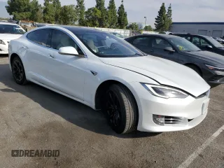 2019 Tesla Model S 100D with VIN 5YJSA1E44KF335113, listed as a Copart auction lot 82936844 with 89,770 mi miles and Salvage title. Bid and sale history available at DreamBid. Image 4.