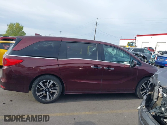 2018 Honda Odyssey Elite with VIN 5FNRL6H94JB067479, listed as a IAAI auction lot 42100911 with 160,174 mi miles and . Bid and sale history available at DreamBid. Image 13.