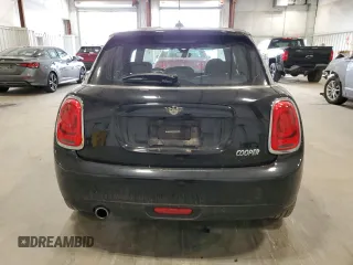 2021 MINI Hardtop 4 Door Oxford Edition with VIN WMWXU7C00M2N49230, listed as a Copart auction lot 77797914 with 51,877 mi miles and Salvage title. Bid and sale history available at DreamBid. Image 6.