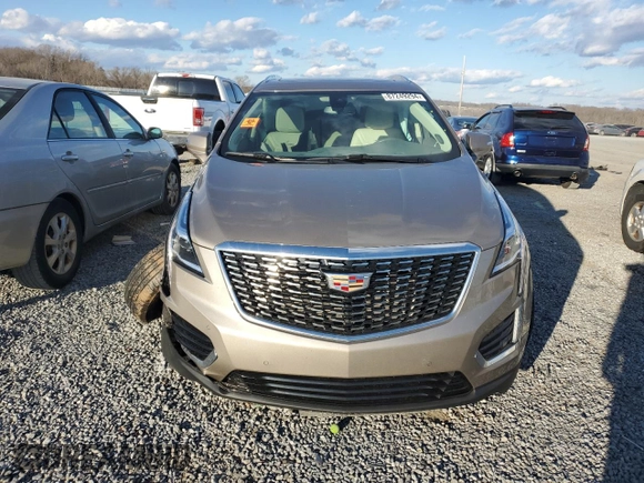 2023 Cadillac XT5 FWD Premium Luxury with VIN 1GYKNCRS6PZ108977, listed as a Copart auction lot 87249294 with 0 mi miles and Salvage Title. Bid and sale history available at carsss.com. Image 5.