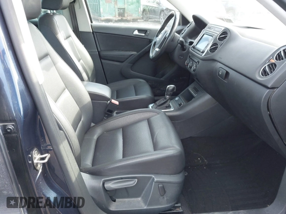 2016 Volkswagen Tiguan S with VIN WVGBV7AX5GW526285, listed as a IAAI auction lot 41445284 with 130,954 mi miles and . Bid and sale history available at DreamBid. Image 5.