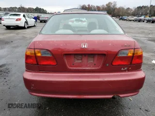 1999 Honda Civic LX with VIN 1HGEJ657XXL047414, listed as a Copart auction lot 83943154 with 300,098 mi miles and Salvage Title. Bid and sale history available at carsss.com. Image 6.