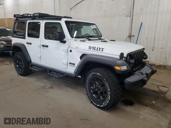 2022 Jeep Wrangler Unlimited Willys with VIN 1C4HJXDM0NW244953, listed as a Copart auction lot 71495154 with 14,577 mi miles and Salvage Title. Bid and sale history available at DreamBid. Image 4.