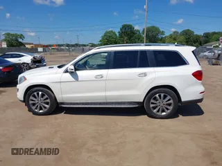 2014 Mercedes-Benz GL 450 with VIN 4JGDF7CE3EA336481, listed as a IAAI auction lot 42647526 with 145,311 mi miles and . Bid and sale history available at DreamBid. Image 14.