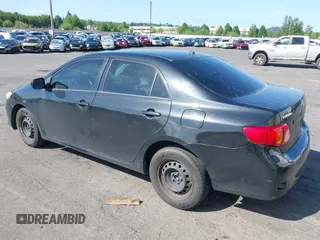 2009 Toyota Corolla with VIN JTDBL40E899046607, listed as a IAAI auction lot 42141452 with 204,769 mi miles. Bid and sale history available at carsss.com. Image 3.