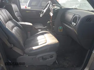 2002 GMC Envoy SLE z VIN 1GKDS13S122357410, wystawiony jako IAAI lot #42355556 z przebiegiem Nie podano mil oraz . Historia ofert i sprzedaży dostępna na DreamBid. Obrazek 5.