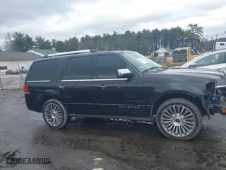 2015 Lincoln Navigator with VIN 5LMJJ2JT6FEJ09931, listed as a IAAI auction lot 41709770 with 137,674 mi miles. Bid and sale history available at carsss.com. Image 14.