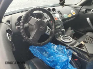 2005 Nissan 350Z Touring z VIN JN1AZ34E05M654954, wystawiony jako Copart lot #57591085 z przebiegiem Nie podano mil oraz Tytuł czysty. Historia ofert i sprzedaży dostępna na DreamBid. Obrazek 8.