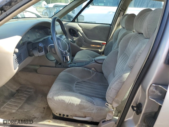 1997 Pontiac Bonneville SE with VIN 1G2HX52K7VH211607, listed as a Copart auction lot 73705454 with 116,307 mi miles and Salvage Title. Bid and sale history available at carsss.com. Image 7.