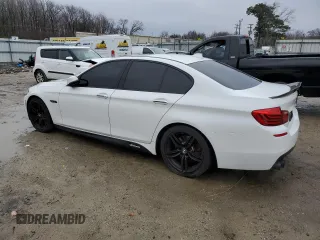 2015 BMW 5 Series 550i with VIN WBAKN9C56FD682337, listed as a Copart auction lot 44209865 with 115,956 mi miles and Clean title. Bid and sale history available at DreamBid. Image 2.