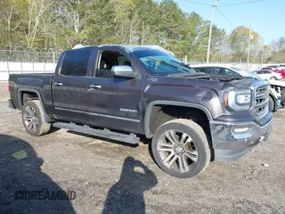 2016 GMC Sierra 1500 SLT with VIN 3GTU2NEC5GG291712, listed as a IAAI auction lot 41924266 with 135,005 mi miles and . Bid and sale history available at DreamBid. Image 1.