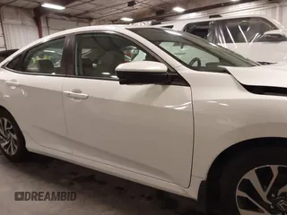 2018 Honda Civic EX with VIN 19XFC2F74JE005647, listed as a IAAI auction lot 41938607 with 90,263 mi miles and . Bid and sale history available at DreamBid. Image 14.