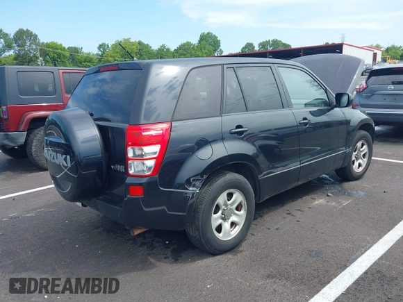 2011 Suzuki Grand Vitara Premium with VIN JS3TE0D22B4100074, listed as a IAAI auction lot 42532421 with 170,451 mi miles and . Bid and sale history available at DreamBid. Image 4.