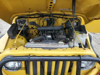 2000 Jeep Wrangler Sport with VIN 1J4FA49SXYP789791, listed as a Copart auction lot 60538875 with Not provided miles and Salvage title. Bid and sale history available at DreamBid. Image 12.