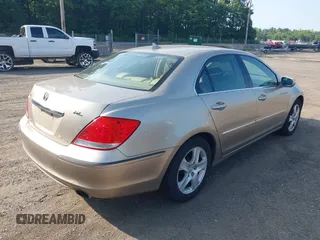 2006 Acura RL z VIN JH4KB16596C005876, wystawiony jako IAAI lot #42666228 z przebiegiem 146 897 mil mil oraz . Historia ofert i sprzedaży dostępna na DreamBid. Obrazek 4.