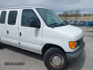 2004 Ford Econoline Cargo with VIN 1FTNE24W84HB38152, listed as a IAAI auction lot 42090193 with 102,357 mi miles. Bid and sale history available at carsss.com. Image 6.