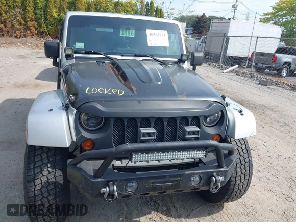 2008 Jeep Wrangler Unlimited Sahara with VIN 1J4GA59158L623784, listed as a IAAI auction lot 40365783 with 185,224 mi miles and . Bid and sale history available at DreamBid. Image 6.