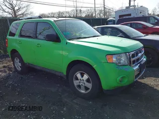 2012 Ford Escape Limited with VIN 1FMCU9E70CKA11998, listed as a IAAI auction lot 41798516 with 999,999 mi miles. Bid and sale history available at carsss.com. Image 1.