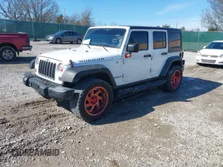 2016 Jeep Wrangler Unlimited Rubicon Hard Rock with VIN 1C4HJWFG9GL296782, listed as a IAAI auction lot 41595273 with 113,338 mi miles. Bid and sale history available at carsss.com. Image 19.
