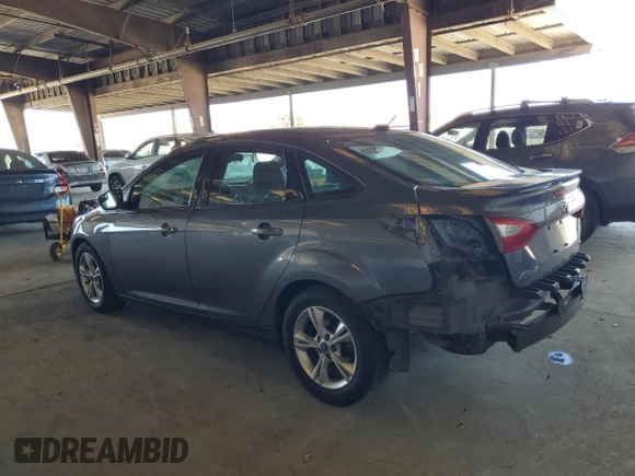 2012 Ford Focus SE with VIN 1FAHP3F28CL114572, listed as a Copart auction lot 63053035 with 142,994 mi miles and Salvage title. Bid and sale history available at DreamBid. Image 2.