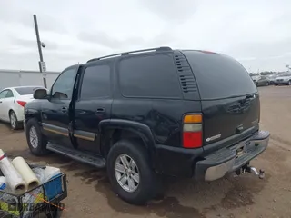 2005 Chevrolet Tahoe LT with VIN 1GNEC13T25R195635, listed as a IAAI auction lot 41581082 with 353,913 mi miles. Bid and sale history available at carsss.com. Image 3.