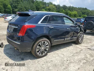 2017 Cadillac XT5 Premium Luxury AWD with VIN 1GYKNERS0HZ239805, listed as a Copart auction lot 61257435 with 104,448 mi miles and Salvage title. Bid and sale history available at DreamBid. Image 3.