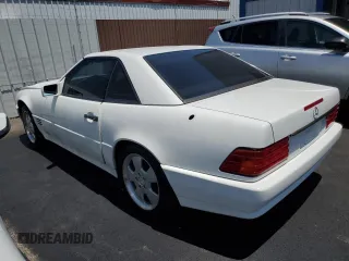 1994 Mercedes-Benz SL z VIN WDBFA63EXRF097007, wystawiony jako Copart lot #59714045 z przebiegiem Nie podano mil oraz Szkoda całkowita • Salvage title. Historia ofert i sprzedaży dostępna na DreamBid. Obrazek 2.