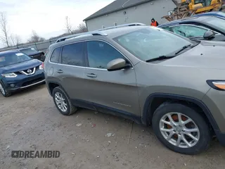 2016 Jeep Cherokee Latitude with VIN 1C4PJLCS4GW347218, listed as a IAAI auction lot 41651285 with 95,169 mi miles. Bid and sale history available at carsss.com. Image 12.