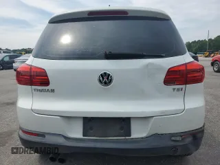 2017 Volkswagen Tiguan S with VIN WVGAV7AX7HK017576, listed as a Copart auction lot 58487455 with 100,034 mi miles and Salvage title. Bid and sale history available at DreamBid. Image 6.