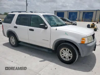 2002 Ford Explorer XLS with VIN 1FMZU62E62UA69368, listed as a Copart auction lot 61571065 with 124,095 mi miles and Salvage title. Bid and sale history available at DreamBid. Image 4.