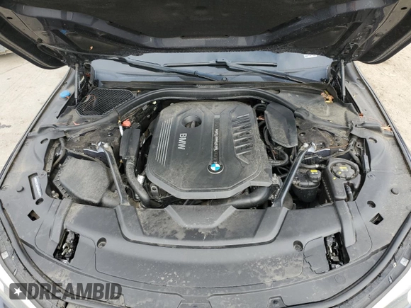 2016 BMW 7 Series 740i with VIN WBA7E2C51GG546677, listed as a Copart auction lot 63455445 with 106,553 mi miles and Salvage title. Bid and sale history available at DreamBid. Image 11.