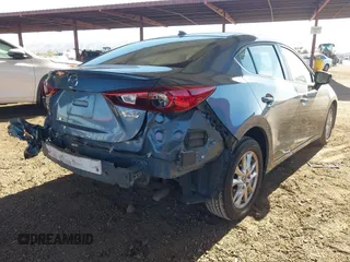 2014 Mazda 3 i Grand Touring with VIN JM1BM1W76E1173191, listed as a IAAI auction lot 41158533 with 120,444 mi miles and . Bid and sale history available at DreamBid. Image 4.