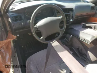 1995 Toyota Corolla DX with VIN 2T1AE09B0SC098739, listed as a Copart auction lot 57653205 with 154,226 mi miles and Salvage title. Bid and sale history available at DreamBid. Image 8.